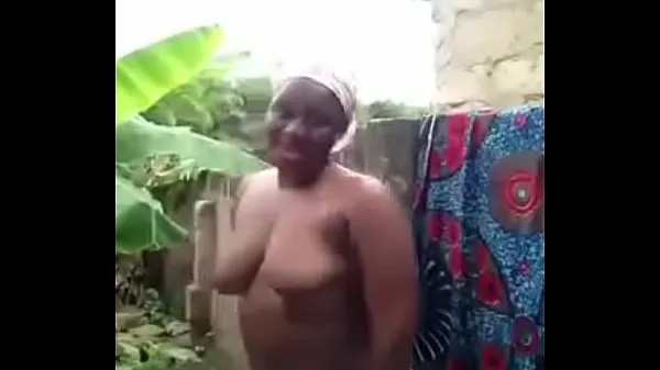 african woman washes in front of her cam Klip hangat segar