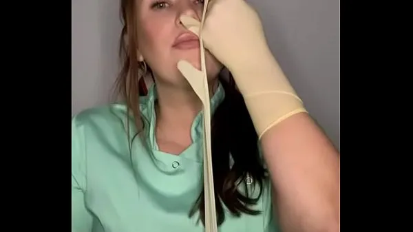 Mature cunt wearing tight latex Gloves 4 Clip ấm áp mới mẻ